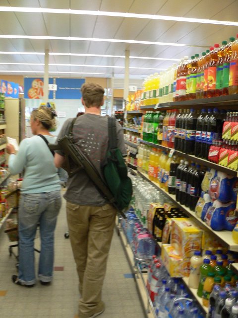 Man with Rifle in Grocery Store (swiss)